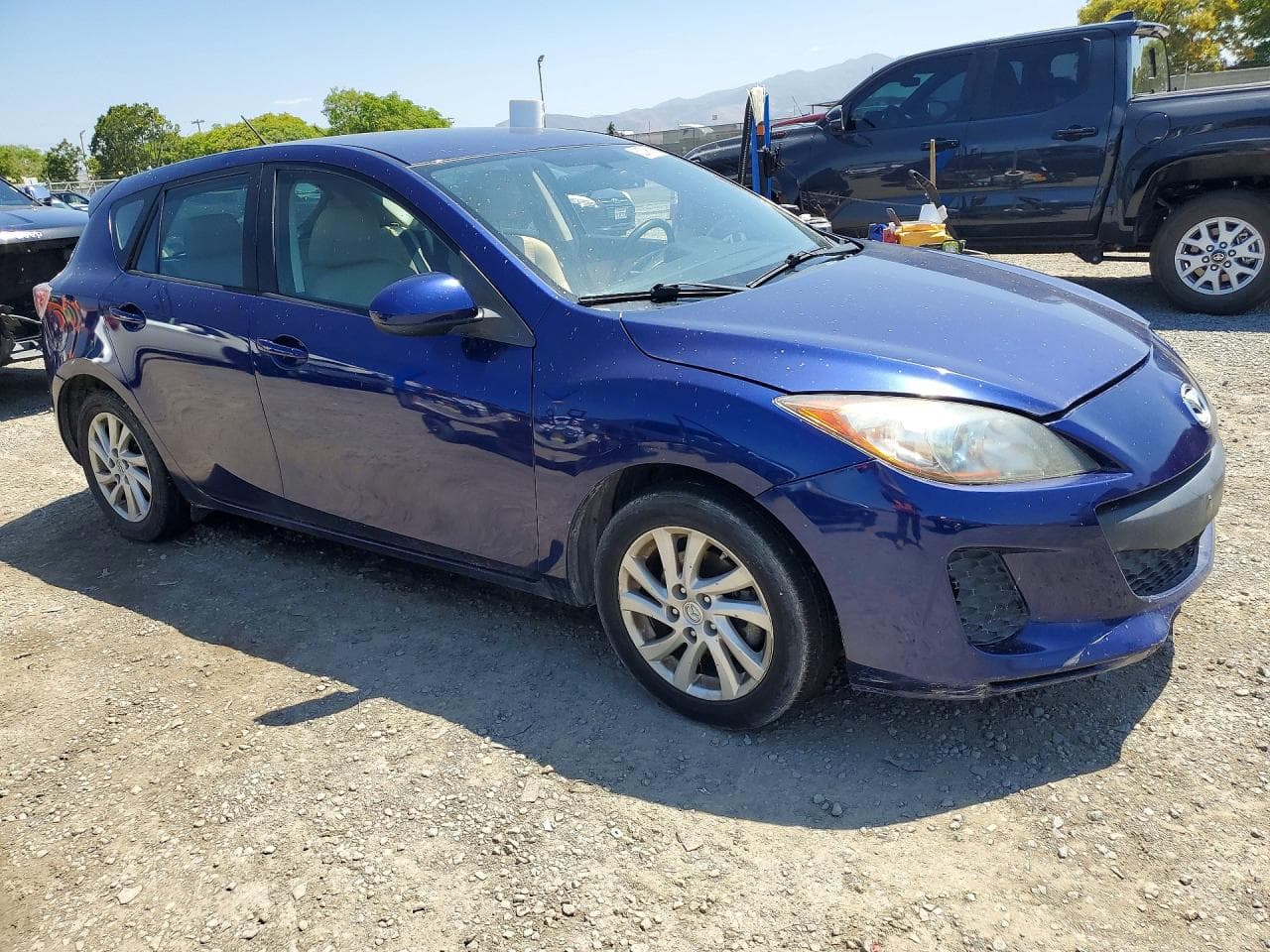 2012 Mazd 323 - foto 4