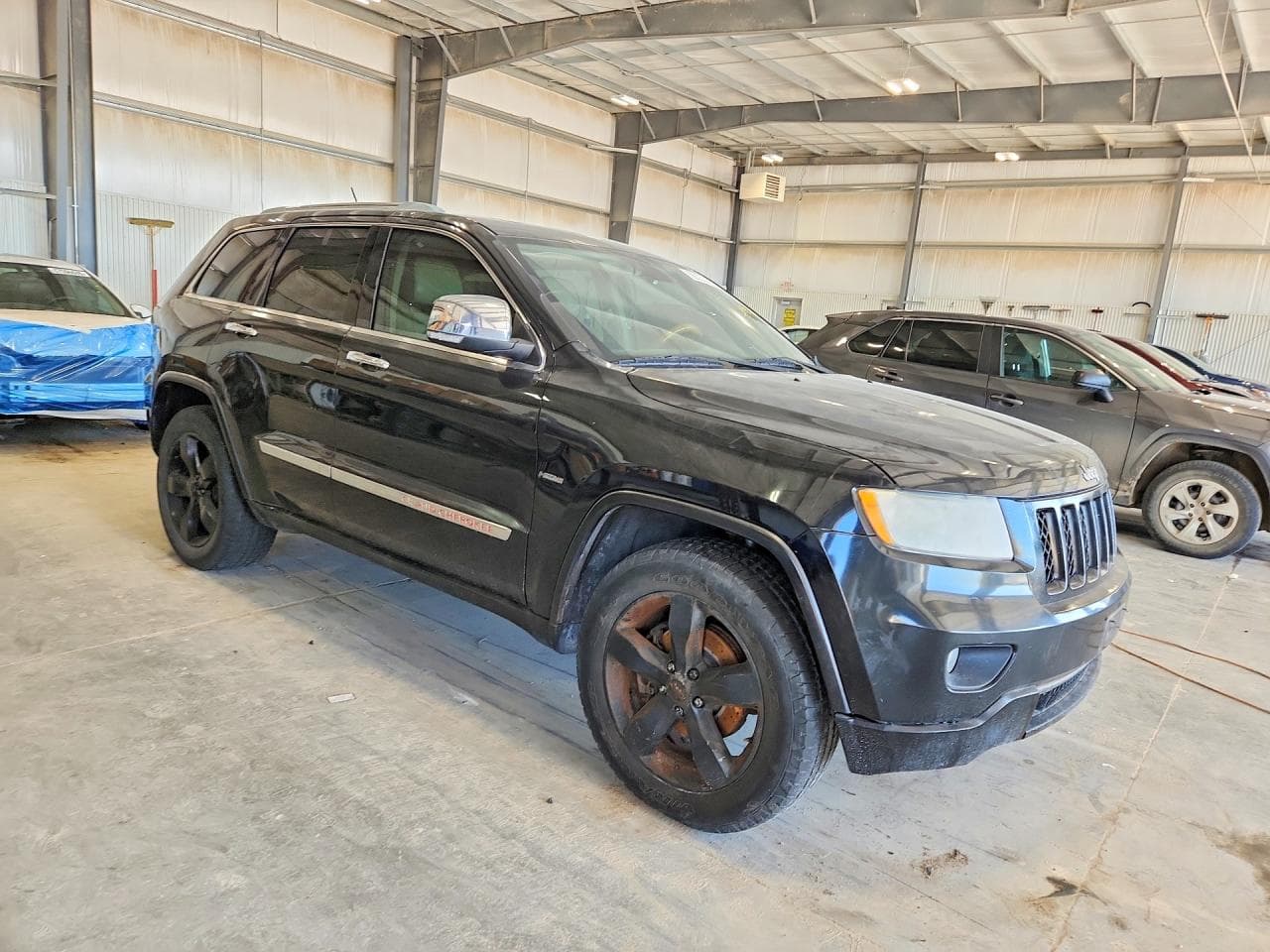 2011 Jeep Grand Cherokee Overland - foto 4